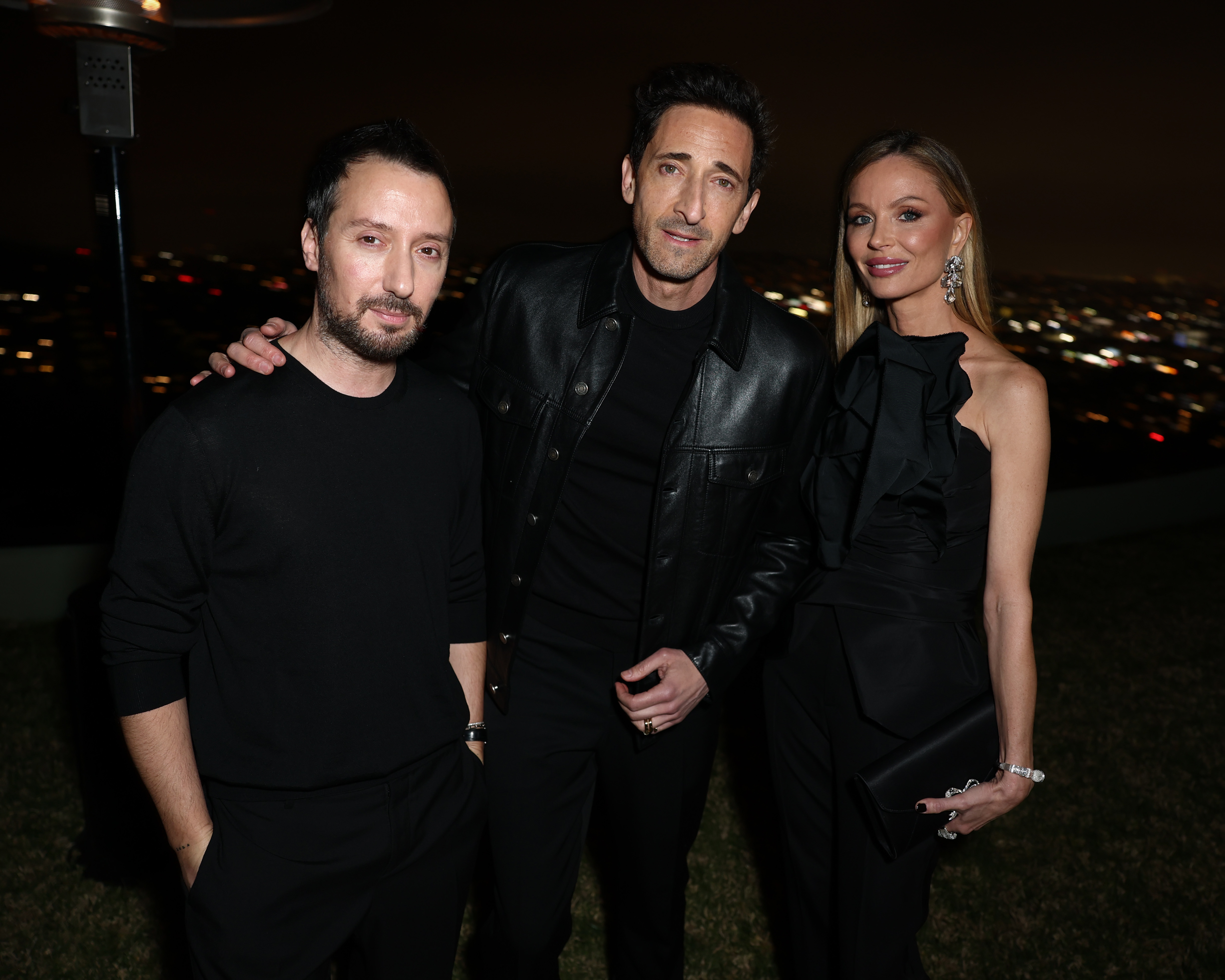 LOS ANGELES, CALIFORNIA - FEBRUARY 28: (L-R) Anthony Vaccarello, Adrien Brody, and Georgina Chapman attend the Saint Laurent x Vanity Fair Pre-Oscar Dinner on February 28, 2025 in Los Angeles, California. (Photo by Matt Winkelmeyer/Getty Images for Saint Laurent )