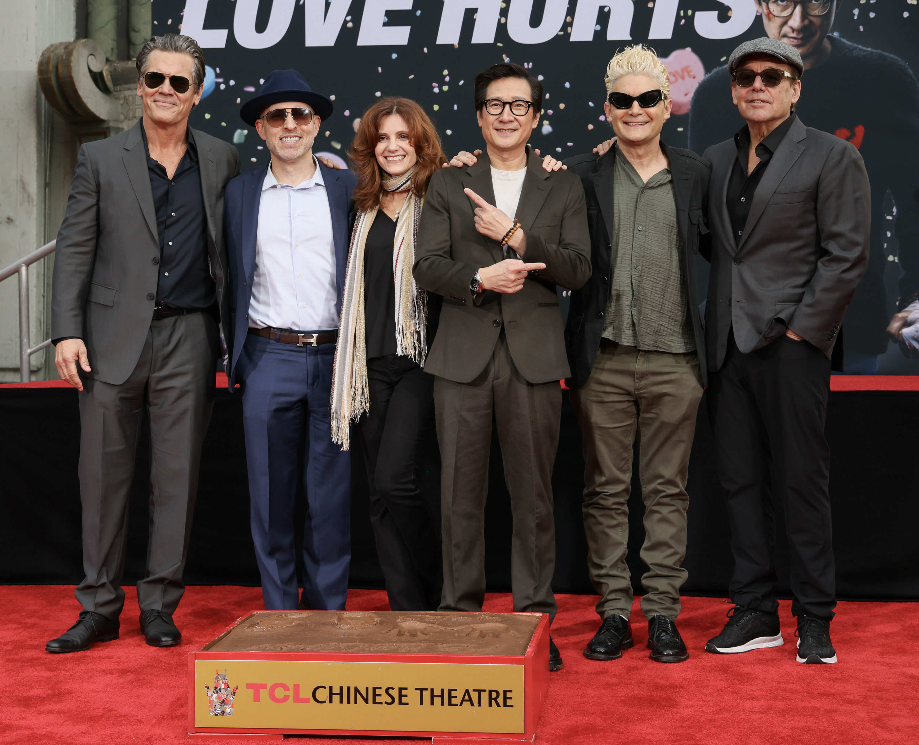 HOLLYWOOD, CALIFORNIA - FEBRUARY 03: (L-R) Josh Brolin, Jeff Cohen, Kerri Green, Ke Huy Quan, Corey Feldman and Chris Columbus attend the hand/footprint in cement ceremony for actor Ke Huy Quan at TCL Chinese Theater on February 03, 2025 in Hollywood, California. (Photo by Rodin Eckenroth/Getty Images)