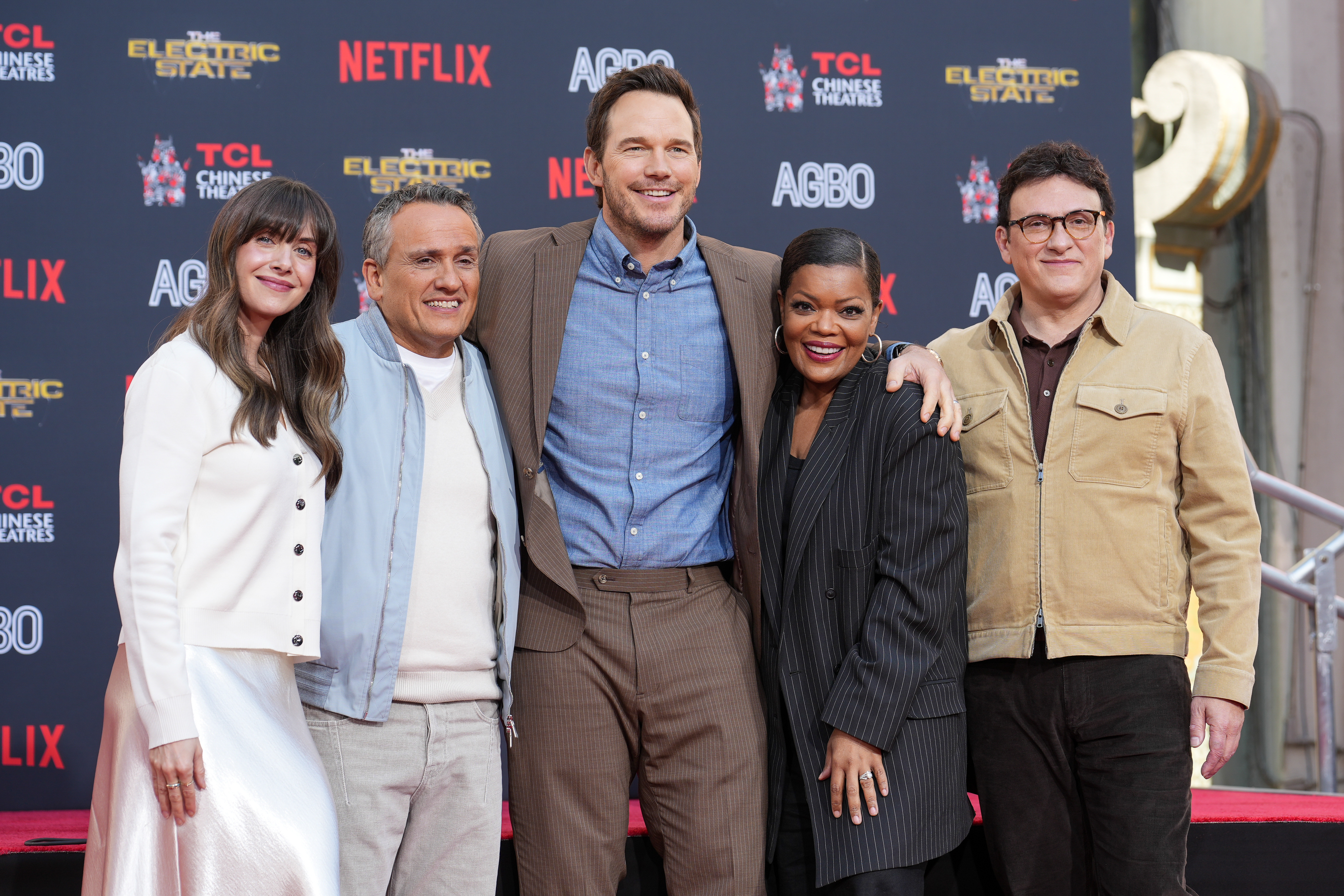 Alison Brie, Joe Russo, Chris Pratt, Yvette Nicole Brown, Anthony Russo at the Handprint and Footprint Ceremony honoring the Russo Brothers at TCL Chinese Theatre at TCL Chinese Theatre on February 21, 2025 in Hollywood, California.