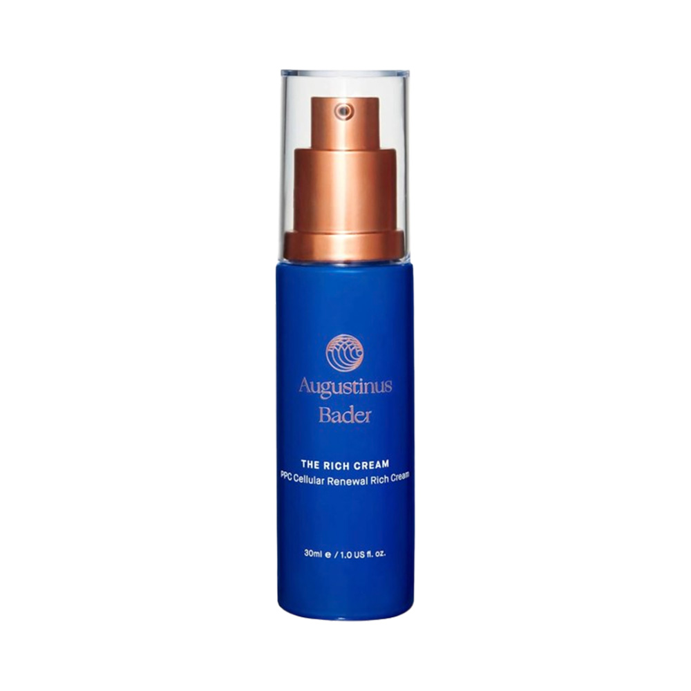 blue and bronze bottle with a clear cap, over a white background