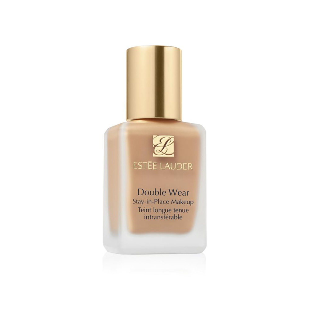 bottle of foundation with shiny golden cap