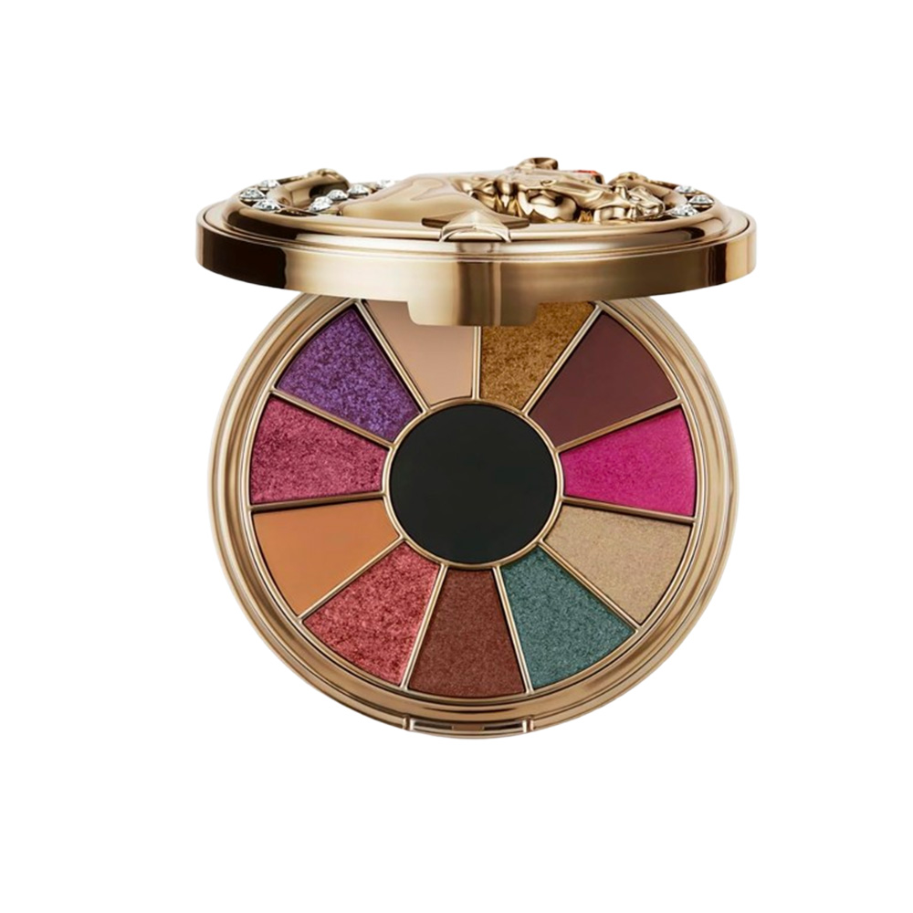 circular wheel of pigments with multiple bright, bold hues ranging from purple to pink