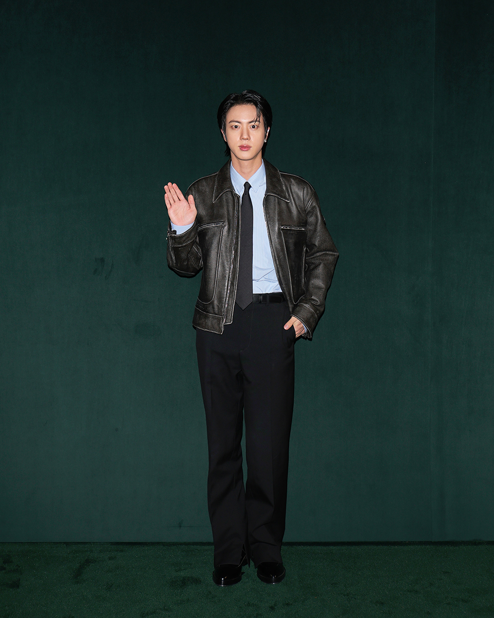 Jin attends Gucci's fall 2025 fashion show on Feb. 25 in Milan.