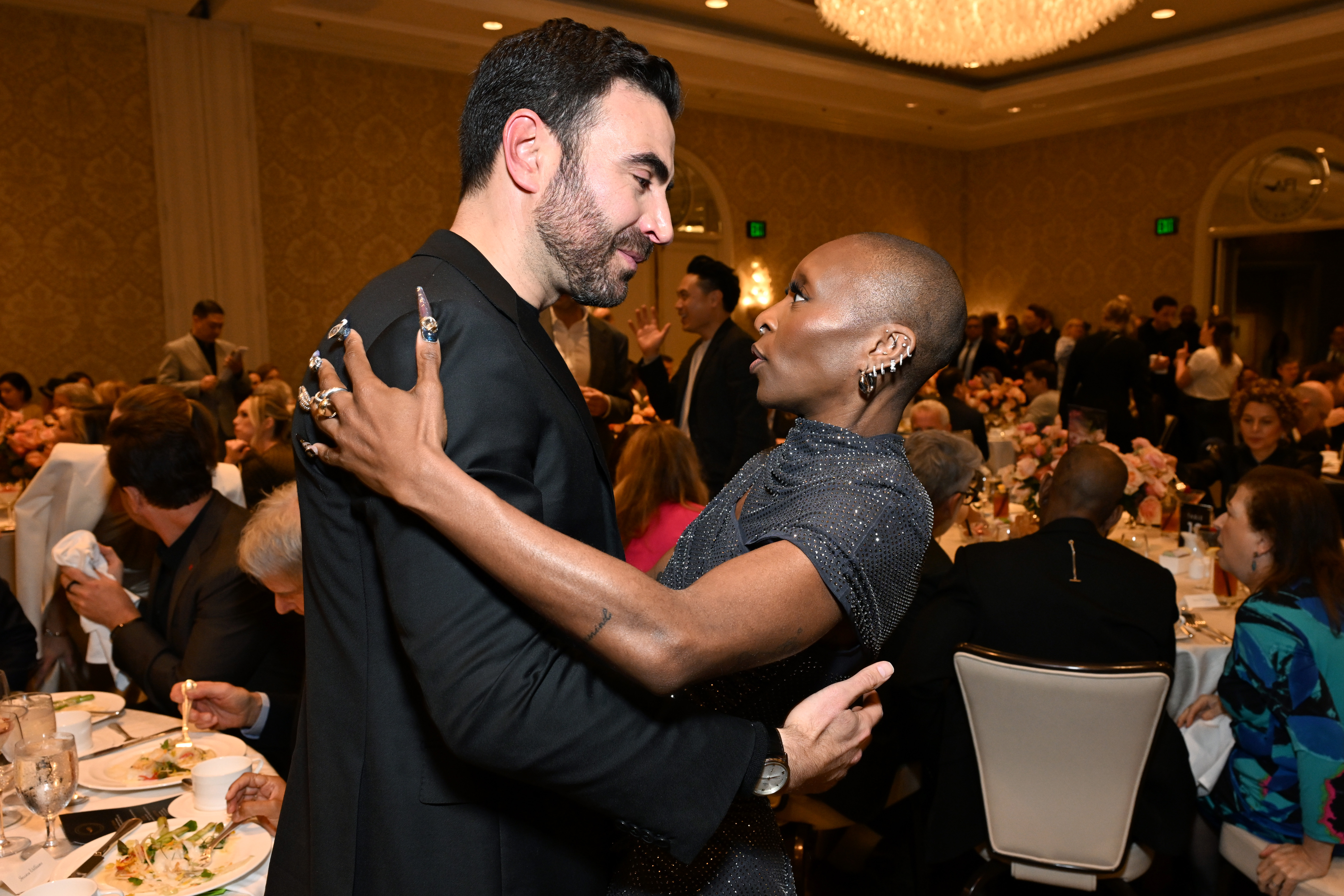 LOS ANGELES, CALIFORNIA - FEBRUARY 06: (L-R) Brett Goldstein and Cynthia Erivo attend the AFI Awards at Four Seasons Hotel Los Angeles at Beverly Hills on February 06, 2025 in Los Angeles, California. (Photo by Michael Kovac/Getty Images for AFI)