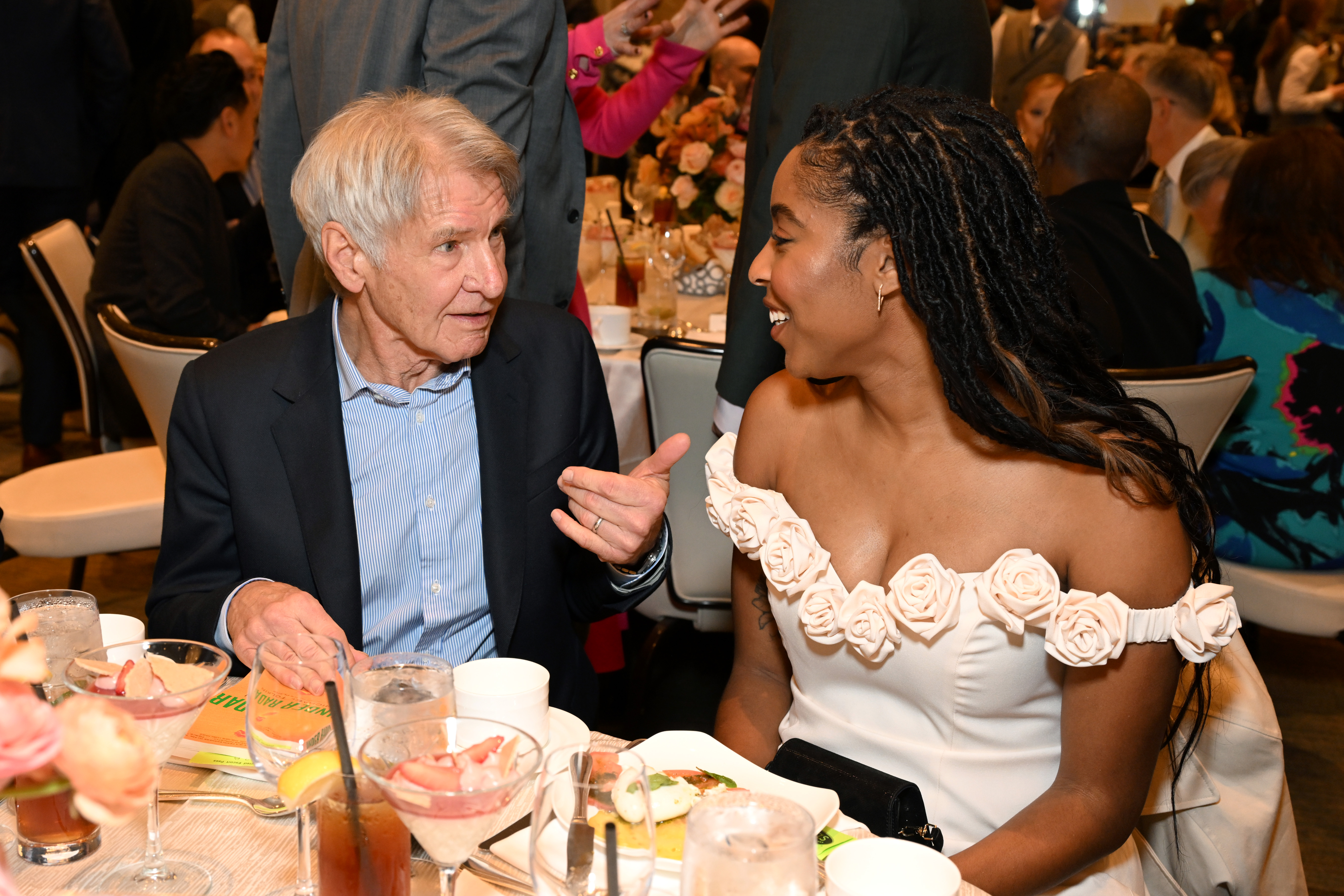 LOS ANGELES, CALIFORNIA - FEBRUARY 06: (L-R) Harrison Ford and Jessica Williams attend the AFI Awards at Four Seasons Hotel Los Angeles at Beverly Hills on February 06, 2025 in Los Angeles, California. (Photo by Michael Kovac/Getty Images for AFI)