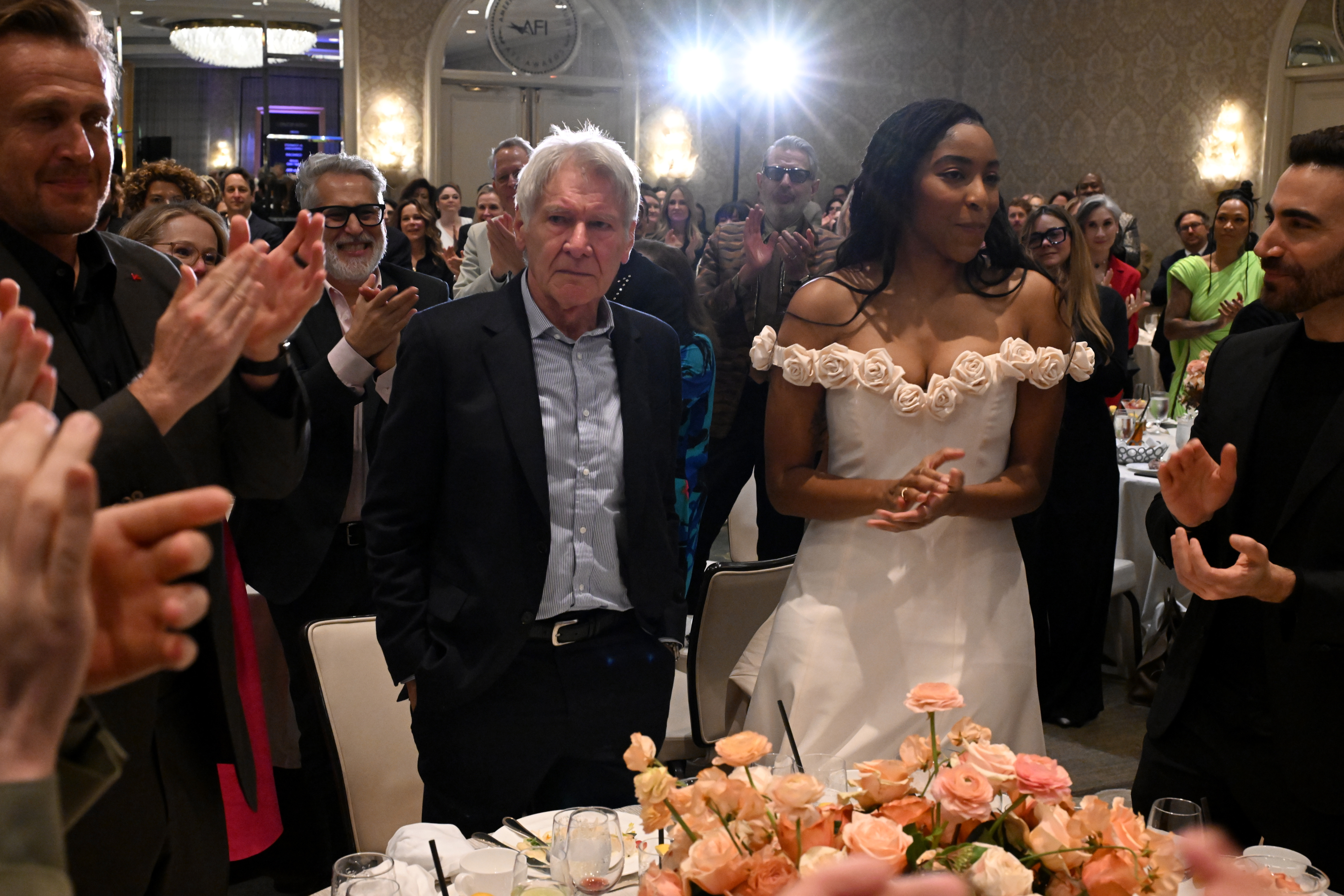 LOS ANGELES, CALIFORNIA - FEBRUARY 06: (L-R) Jason Segel, Harrison Ford, Jessica Williams and Brett Goldstein attend the AFI Awards at Four Seasons Hotel Los Angeles at Beverly Hills on February 06, 2025 in Los Angeles, California. (Photo by Michael Kovac/Getty Images for AFI)