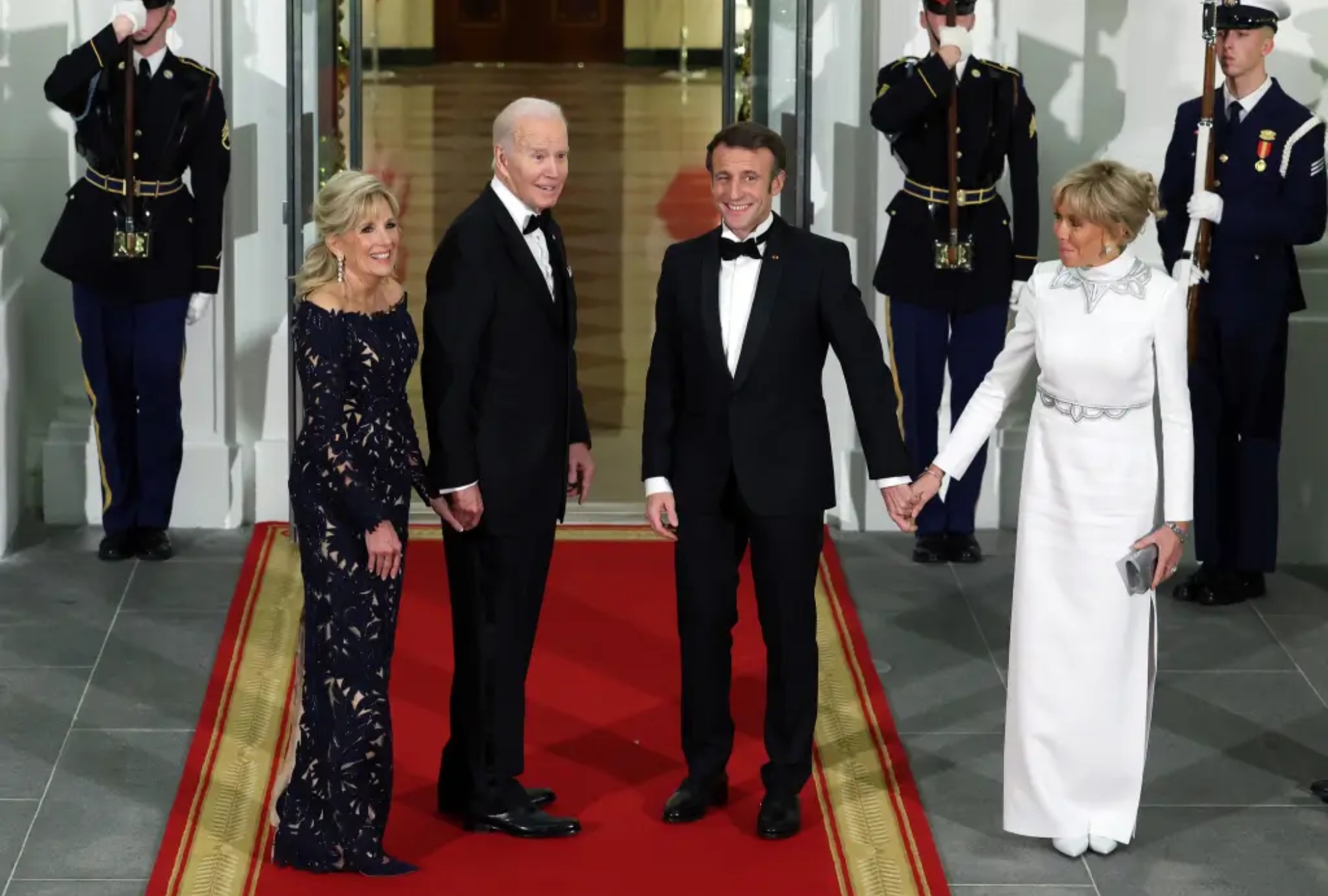U.S. President Joe Biden and first lady Jill Biden welcome French President Emmanuel Macron and his wife Brigitte Macron to the North Portico of the White House ahead of the state dinner on December 1, 2022 in Washington, DC.
