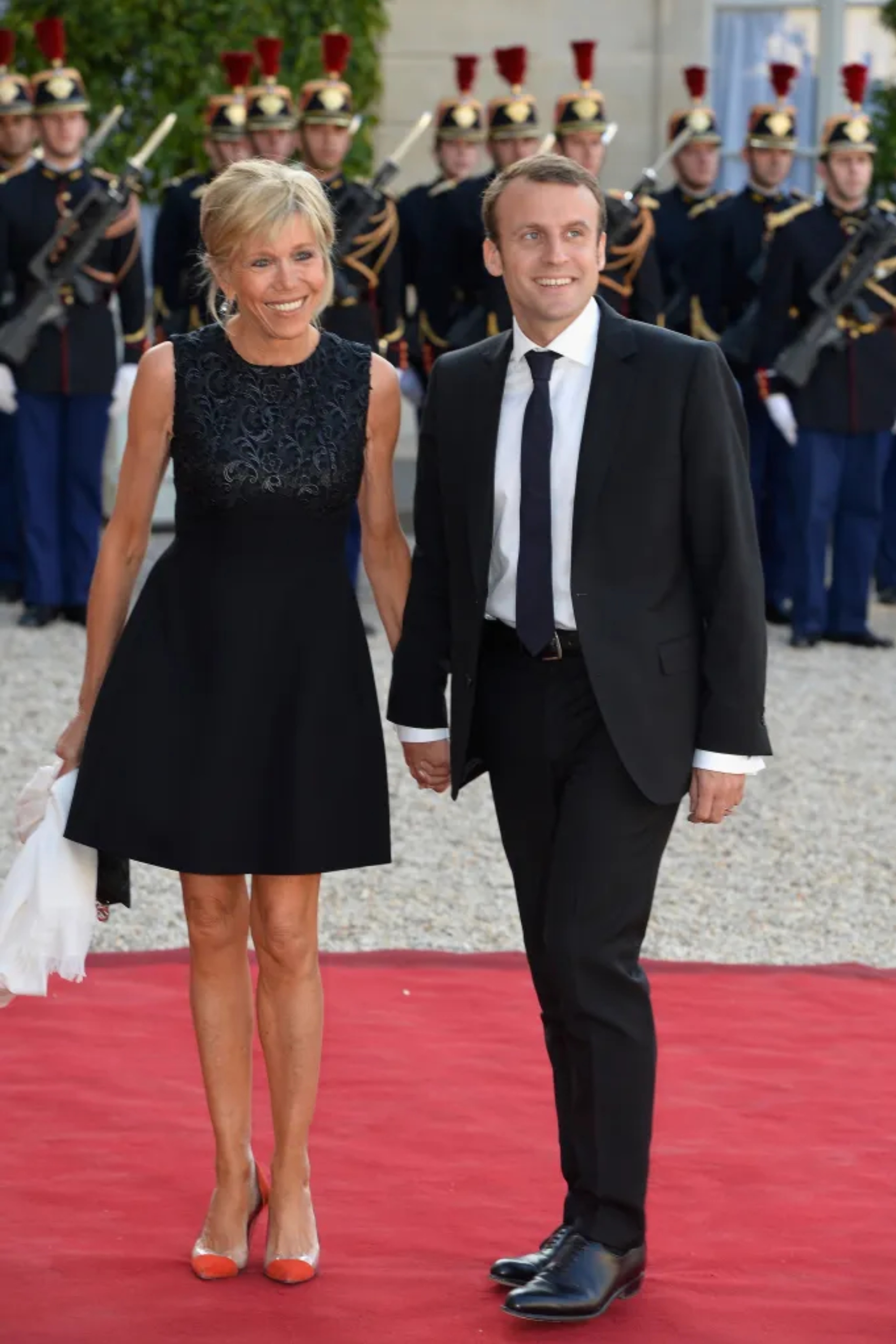 French Minister of Economy Emmanuel Macron and Brigitte Macron arrive for the State Dinner Offered By French President François Hollande at the Elysee Palace on June 2, 2015 in Paris, France.