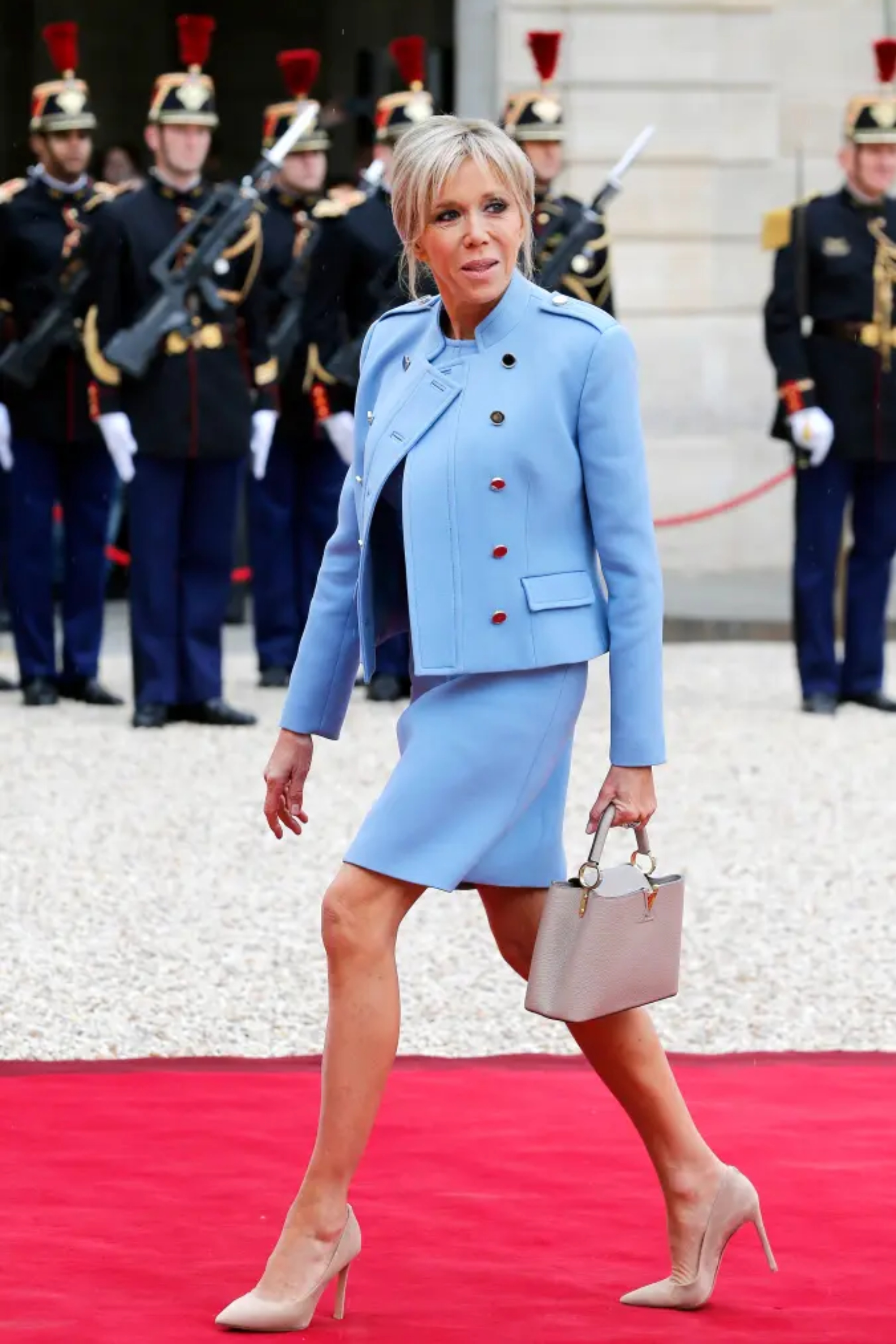 Wife of France's newly-elected President Emmanuel Macron, Brigitte Trogneux arrives at the Elysee Presidential Palace for the handover ceremony between France's newly-elected President Emmanuel Macron and outgoing President Francois Hollande on May 14, 2017 in Paris, France.